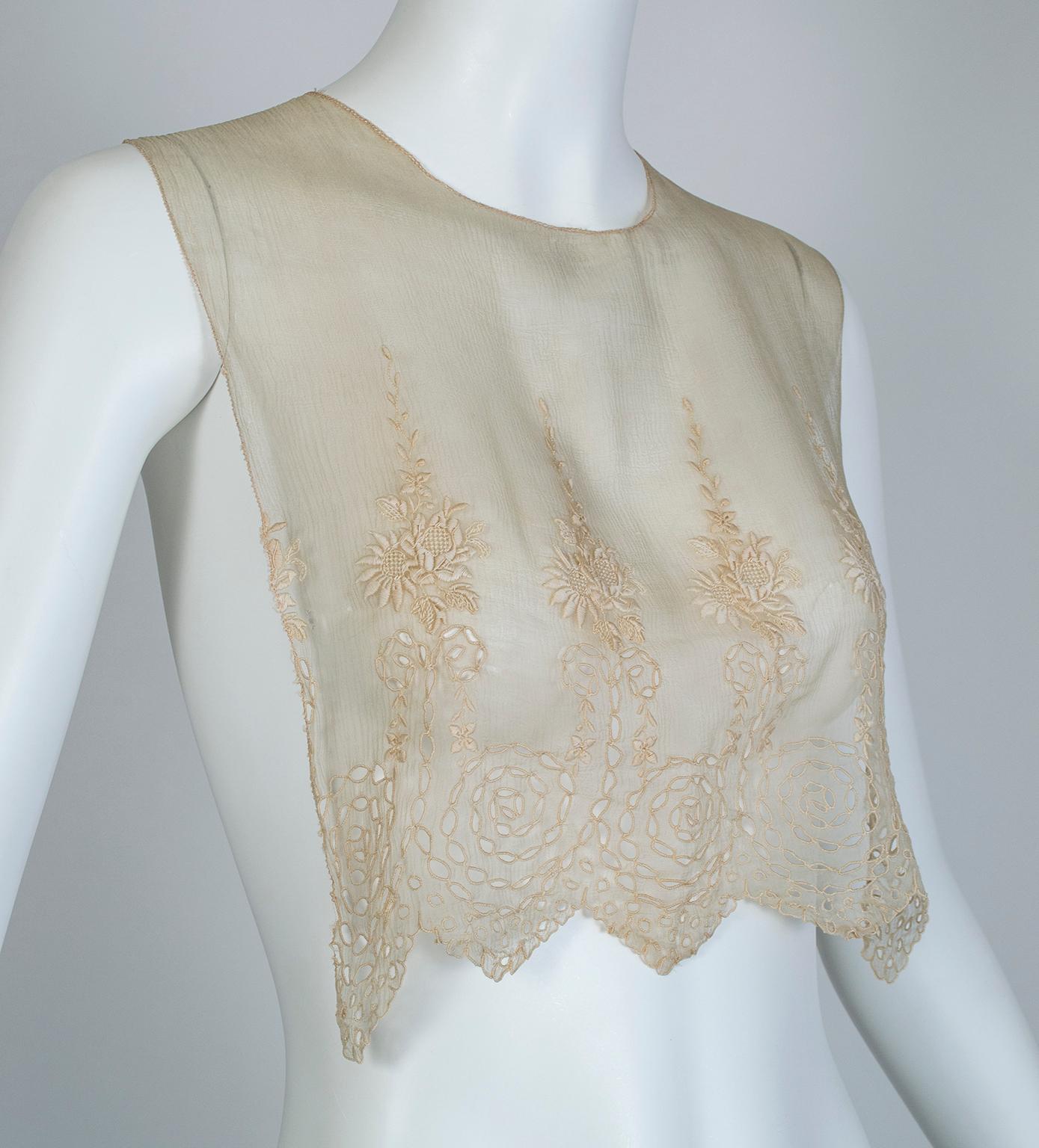 Featuring gossamer lightness and masterful needlework, these two beautiful pieces date from the dawn of the Edwardian Era, when well-bred women took care to cover their décolletage during the day and revealed it for evening. One can see traces of
