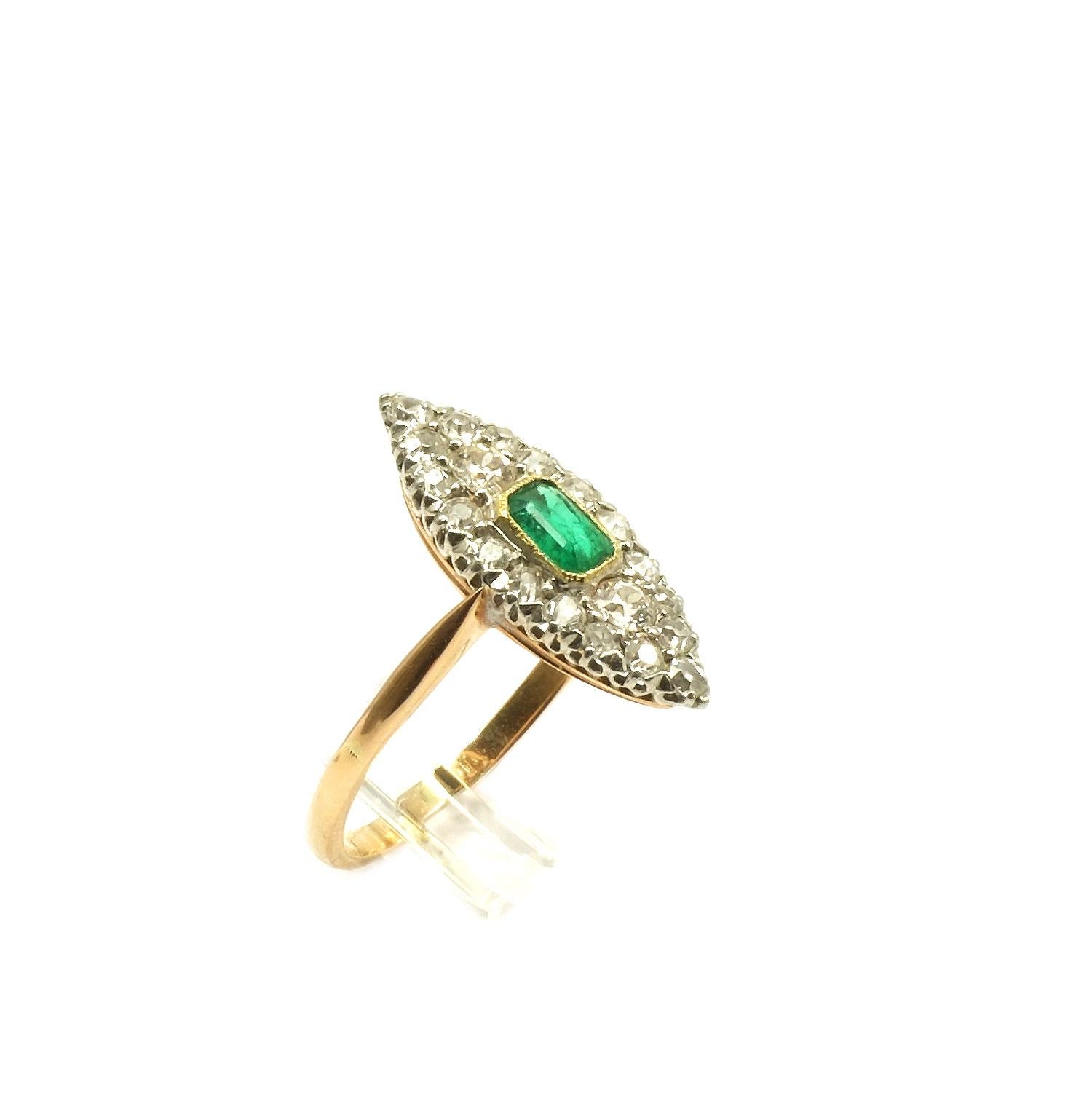 Edwardian Emerald and 0.78 Carat Diamond Gold Ring, cira 1915

Very elegant diamond ring made of rose gold with a boat-shaped ring head, densely set with a central, bright green emerald and pavé set with 26 old cut diamonds, 0.78 ct in total, set in