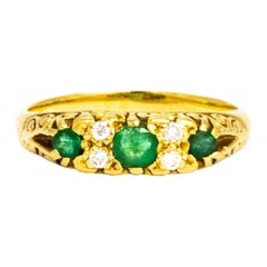 Dreisteiniger Ring aus 18 Karat Gold mit edwardianischem Smaragd und Diamant