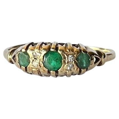 Edwardian Emerald and Diamond 9 Carat Gold Three-Stone Ring For Sale