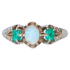 Edwardian Emerald and Opal 9 Carat Gold Three Stone Ring