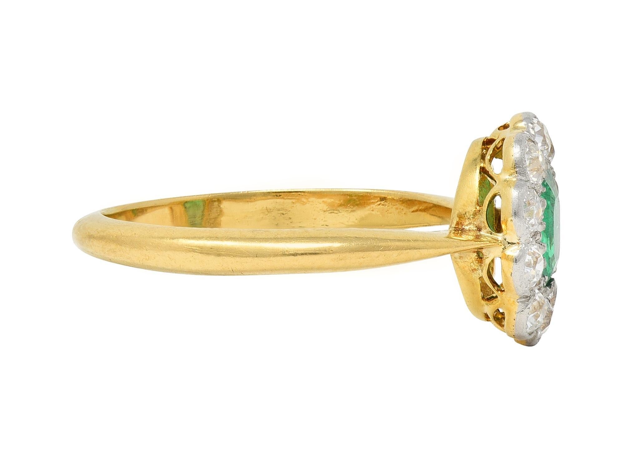 Emerald Cut Edwardian Emerald Diamond Platinum 18 Karat Yellow Gold Antique Halo Ring For Sale