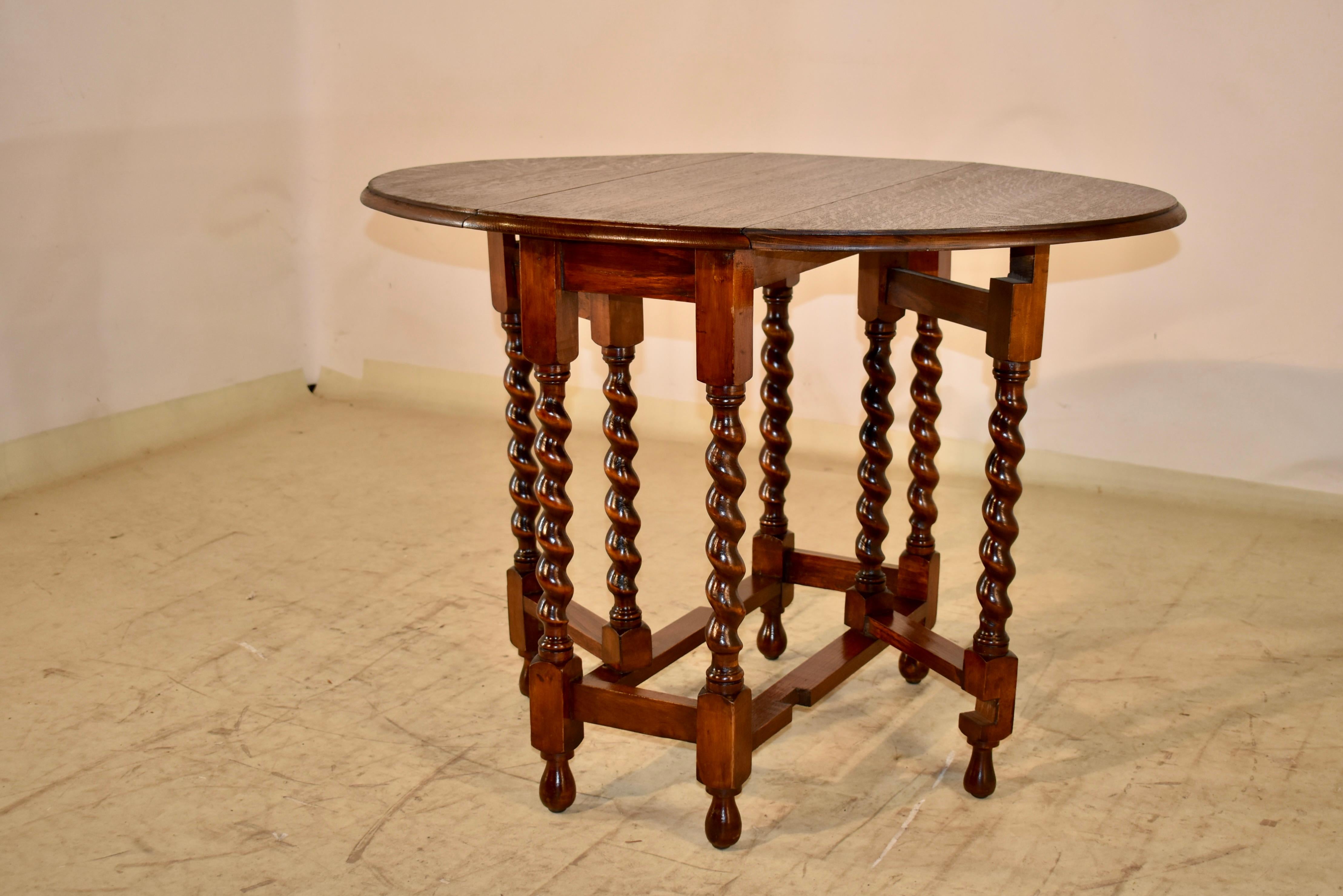 Turned Edwardian English Oak Gate Leg Table, Circa 1900 For Sale