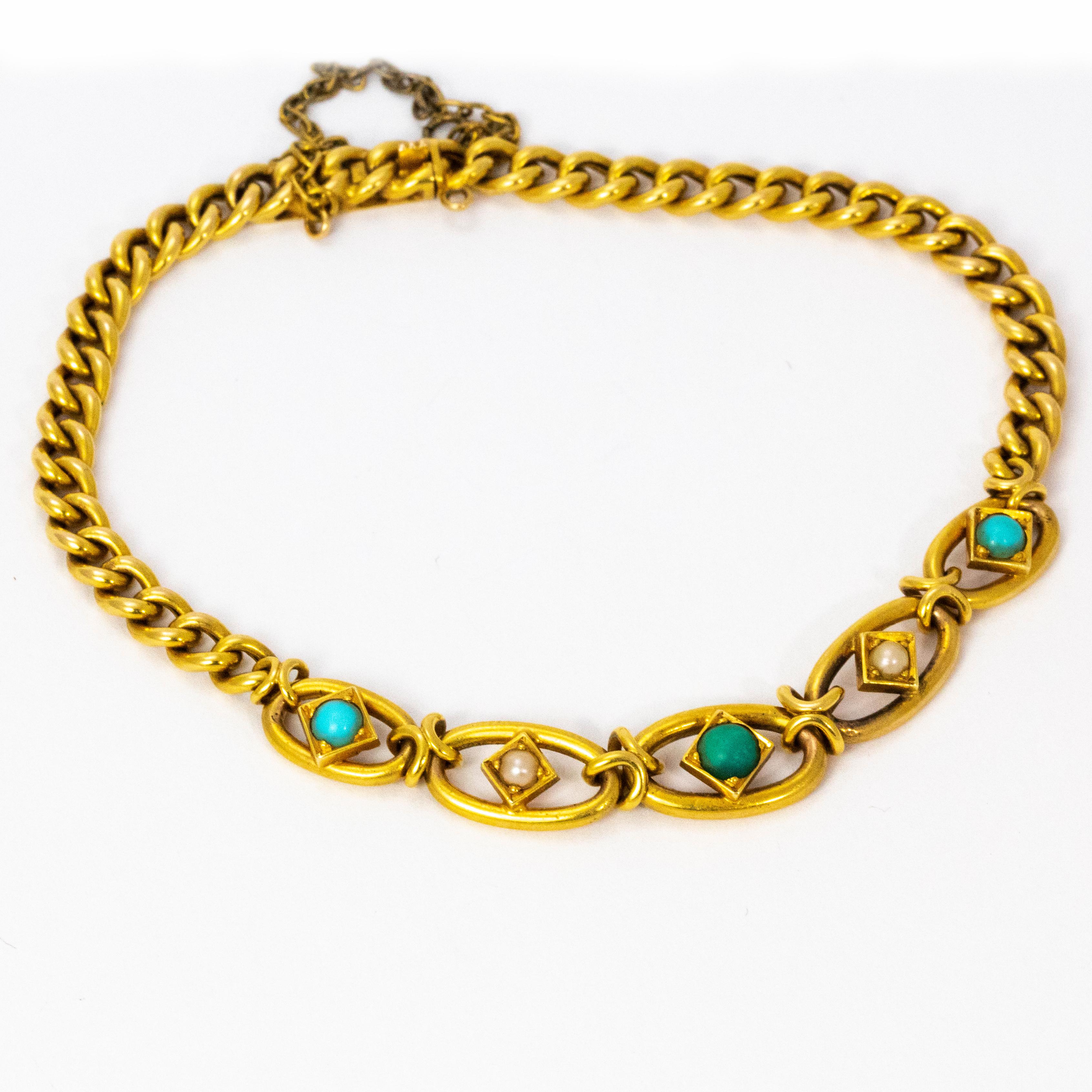 A superb 15 karat yellow gold curb link bracelet decorated beautifully with alternating turquoise and pearls. 