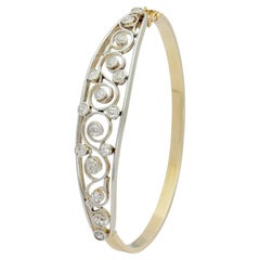 Bangle con cerniera in oro giallo 14 carati e diamanti, epoca edoardiana