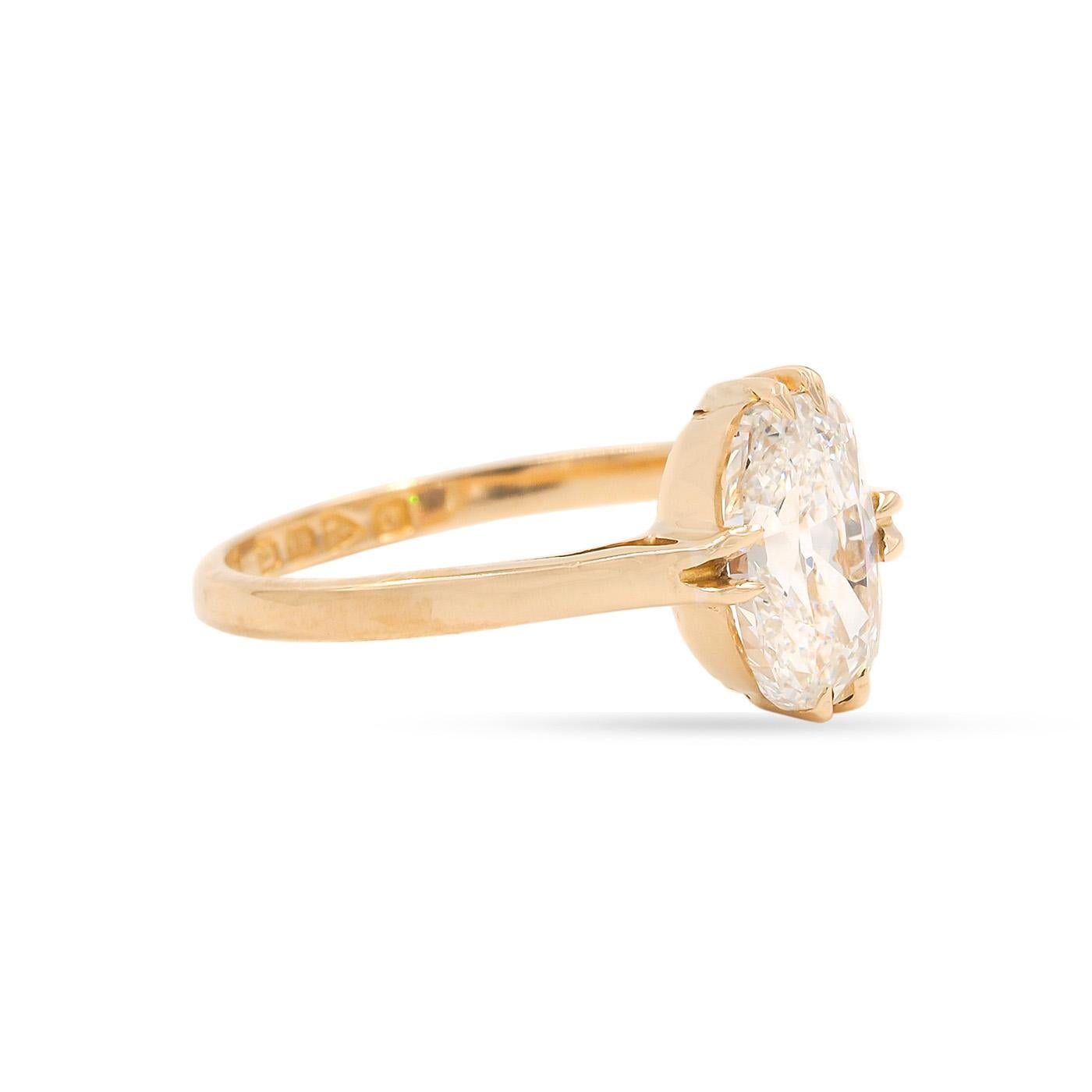 Edwardian era featuring a unique 1.52 Carat Elongated Old Mine Cushion Cut Diamond. Composed of 18k yellow gold. The diamond is GIA certified G color & VVS2 clarity. With double claw prongs at the top and sides of the diamond. English origin,