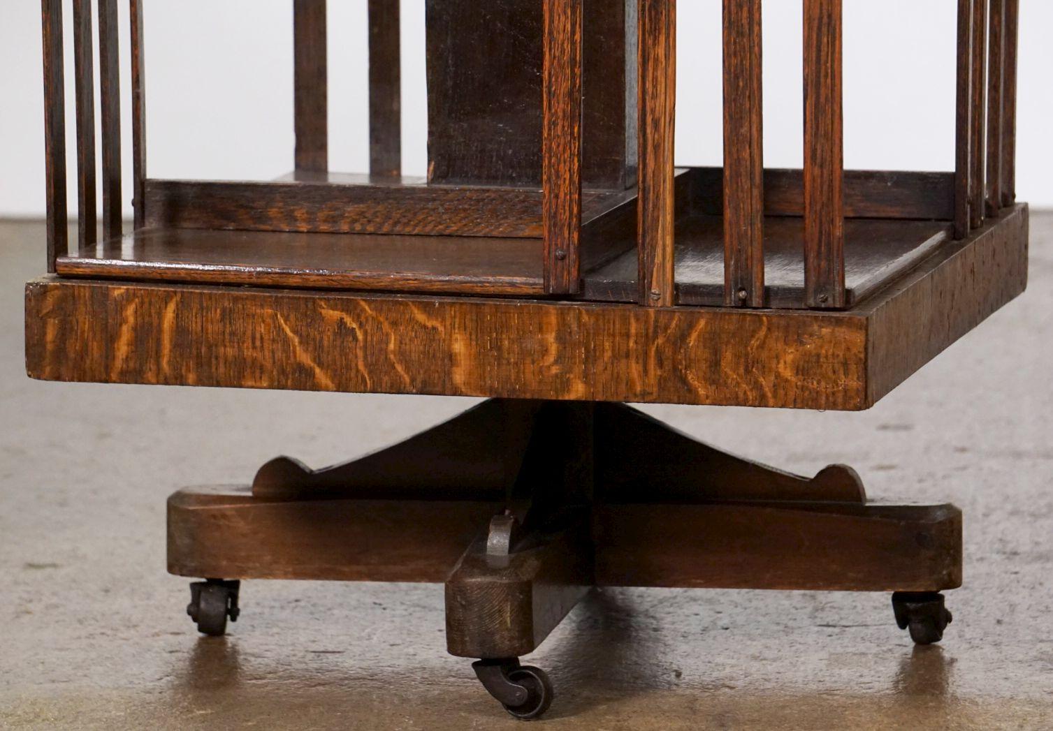 Edwardian-Era Revolving Bookcase or Library Stand of Oak on Rolling Casters 10