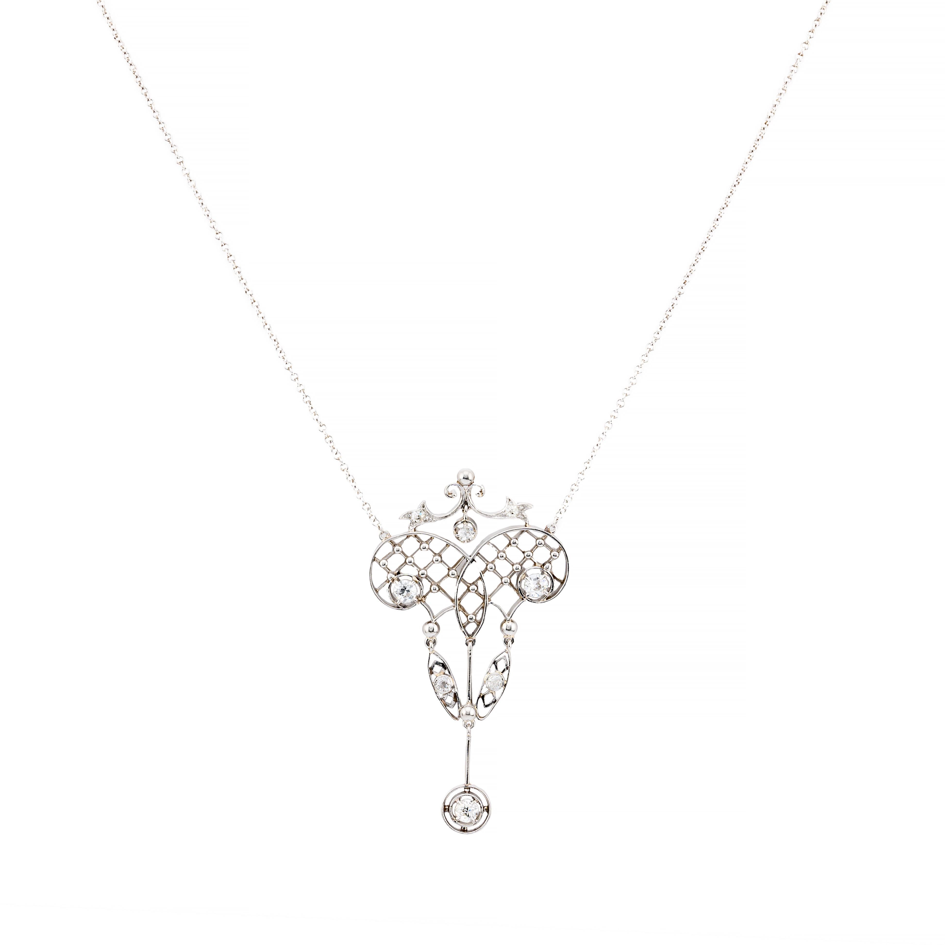 Aston Estate Jewelry Presents:

An Edwardian style pendant necklace featuring intricate latticework and scroll motifs.

Adorned with European cut diamonds totaling 0.85 carats, G color, VS2 clarity.

Crafted in platinum, showcasing exquisite