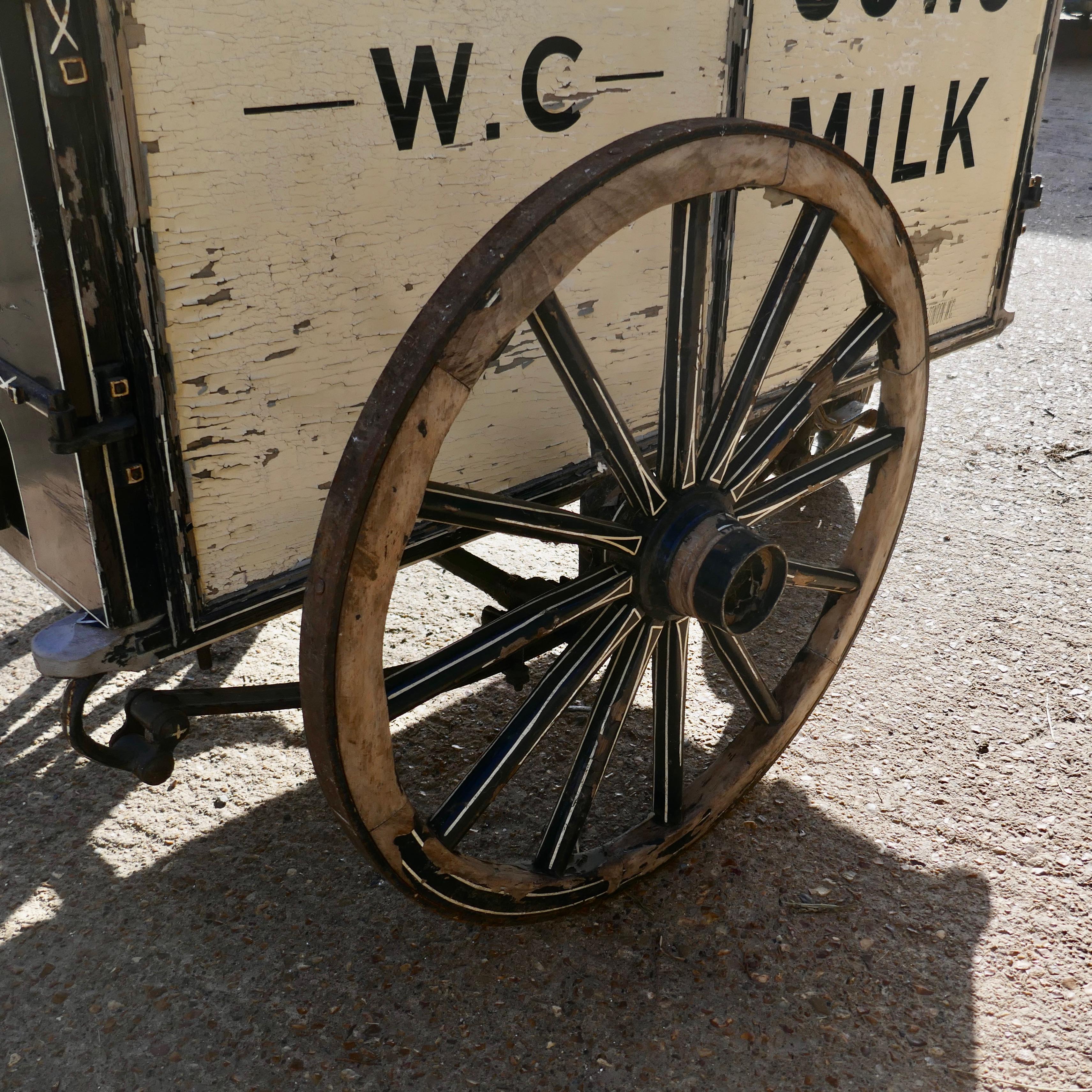 Edwardian express dairy delivery milk cart

This is a very rare survivor of early London door step milk deliveries, the top section holds crates and glass milk bottles, there are a few replacements here and they have been painted to look as though