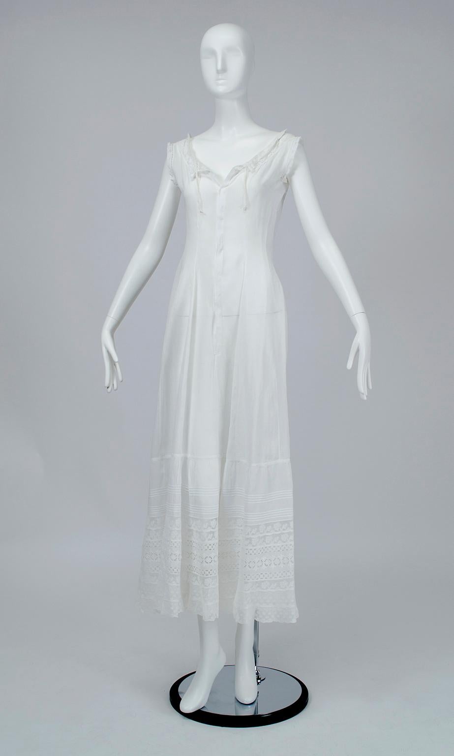 Though it looks and wears like a nightgown, this incredible garment was actually the Edwardian equivalent of a full slip and would have been worn beneath a corset, up to three additional petticoats and another dress. Its shapely princess seams,