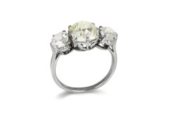 Edwardian 3.16 carat Fancy Light Yellow Diamond Three-Stone Ring, circa 1910