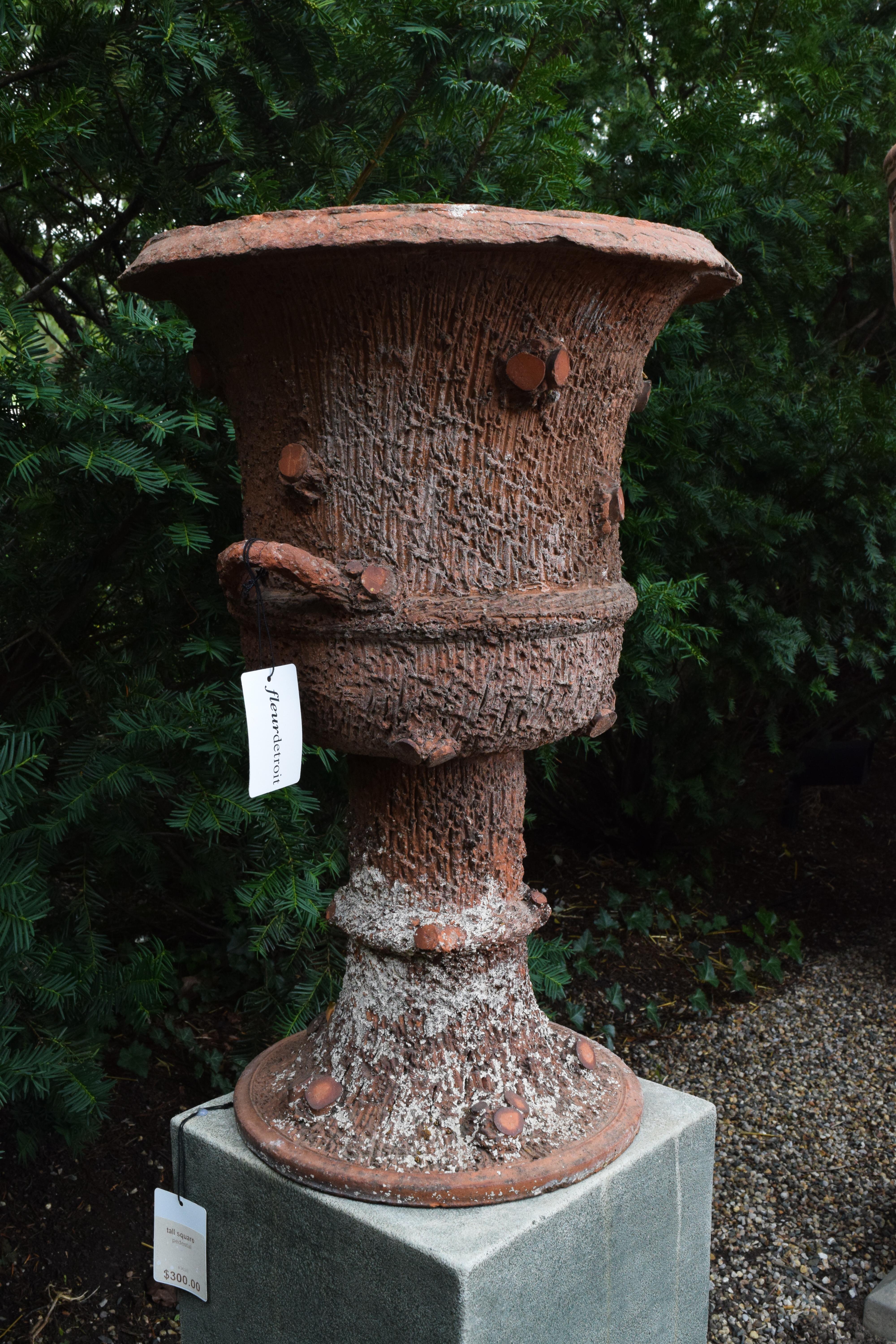 Faux Bois was at its height during the Art Nouveau era in France between the 19th and 20th century. Originally predominantly cast in concrete, this urn is a unique find cast in terracotta. Realistic bark detail and cut limbs, this jardinière is a