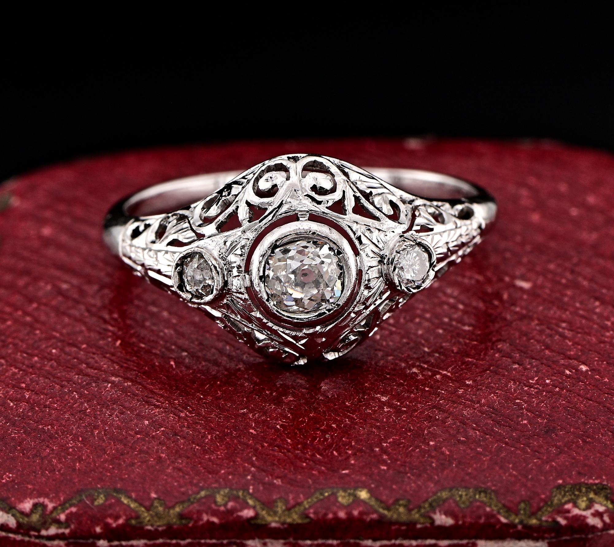 Appealing Edwardian period Diamond ring, 1915 circa
Skillfully hand crafted in lovely domed filigree work solid 18 KT gold
Principle Diamond is an old mine cut of . 35 Ct bright white full of sparkle being deep cut

assessed G/H SI  - complementary
