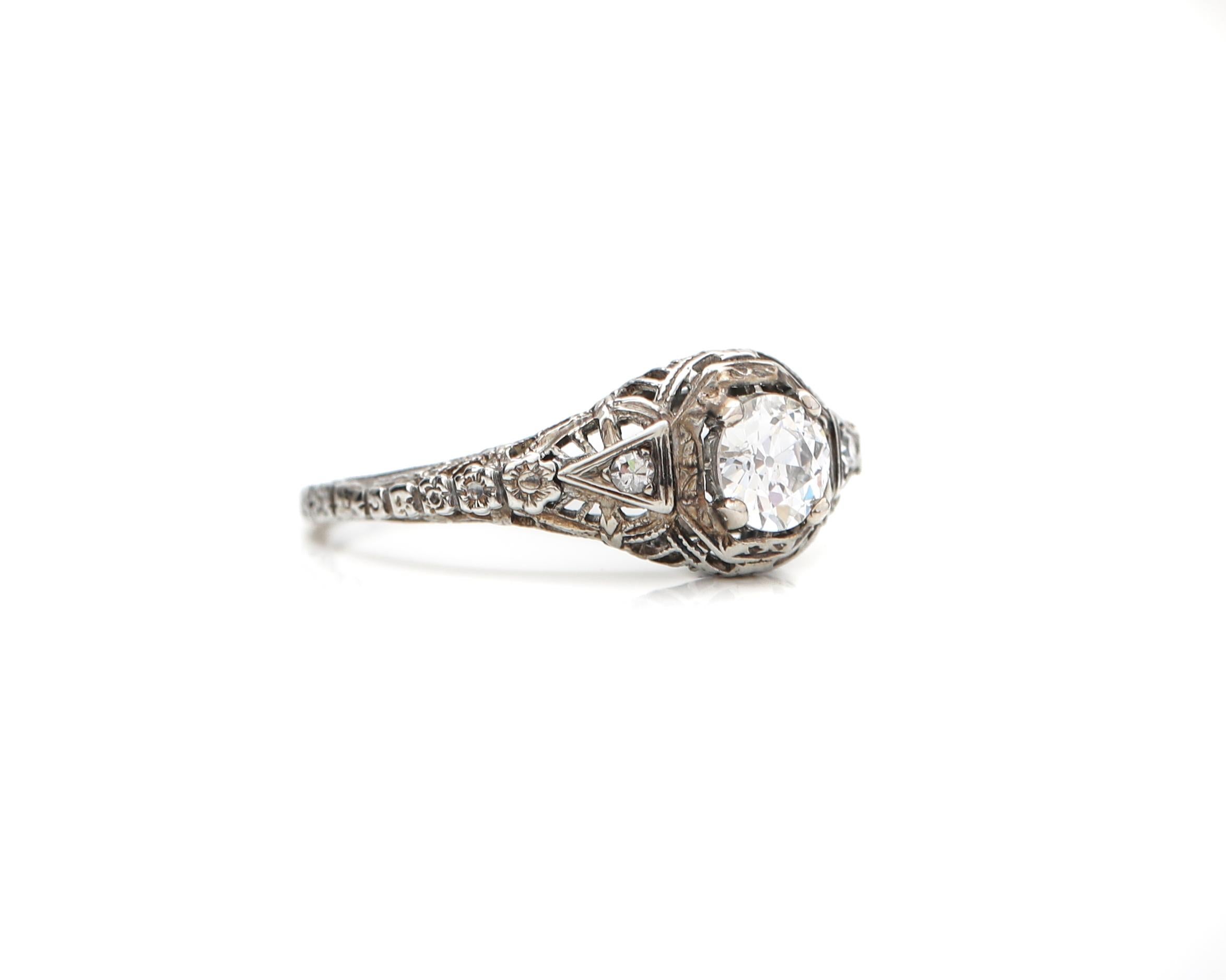 Description: 

This amazing Victorian era beauty is sure to turn heads! The exhibits the original dark patina from this time period . Intricate carving and filigree work from shoulder down to the bottom of the shank. 

This is a true antique piece,
