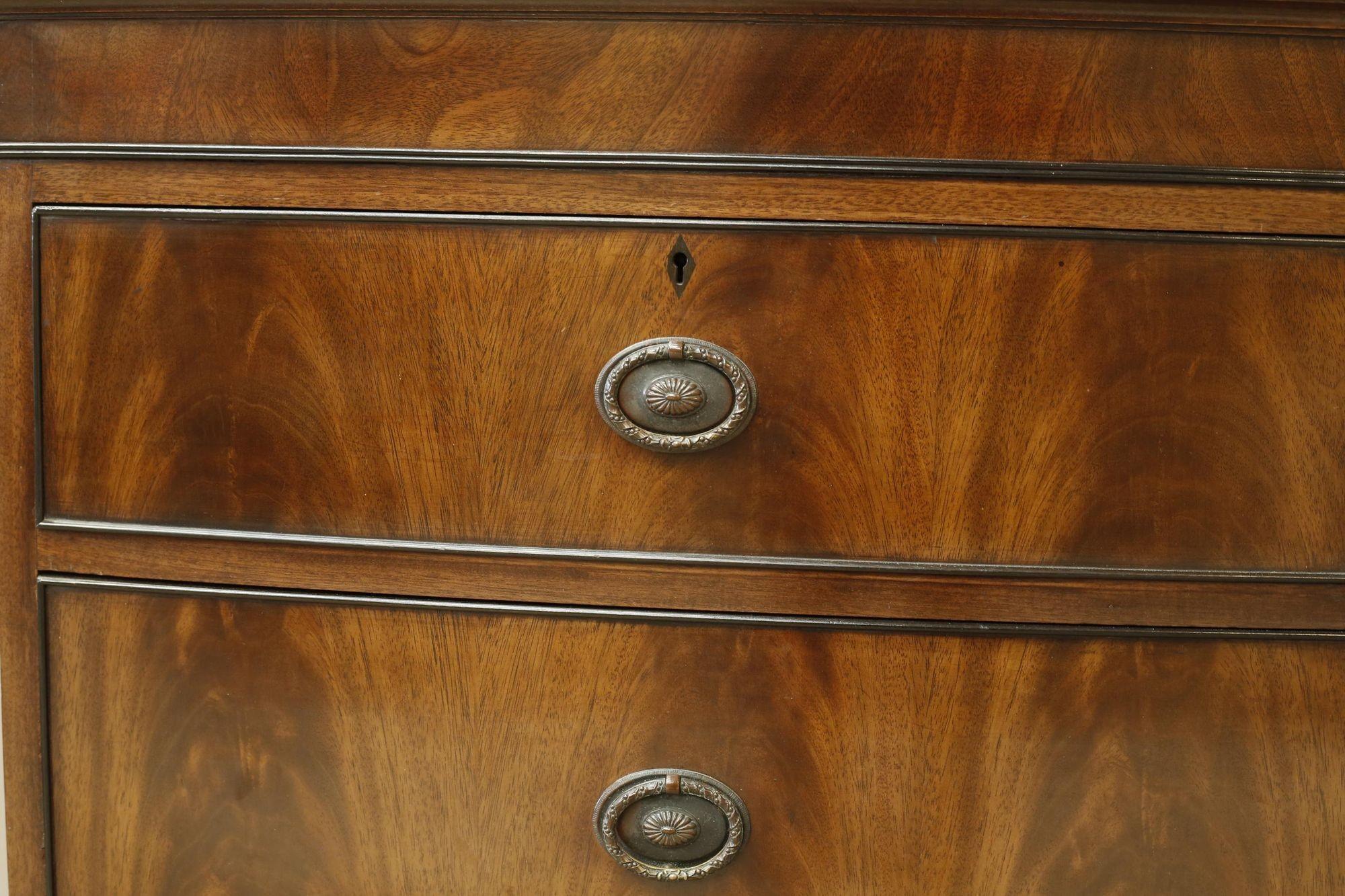 Edwardian flame mahogany chest of drawers by Marsh, Jones & Cribb 2