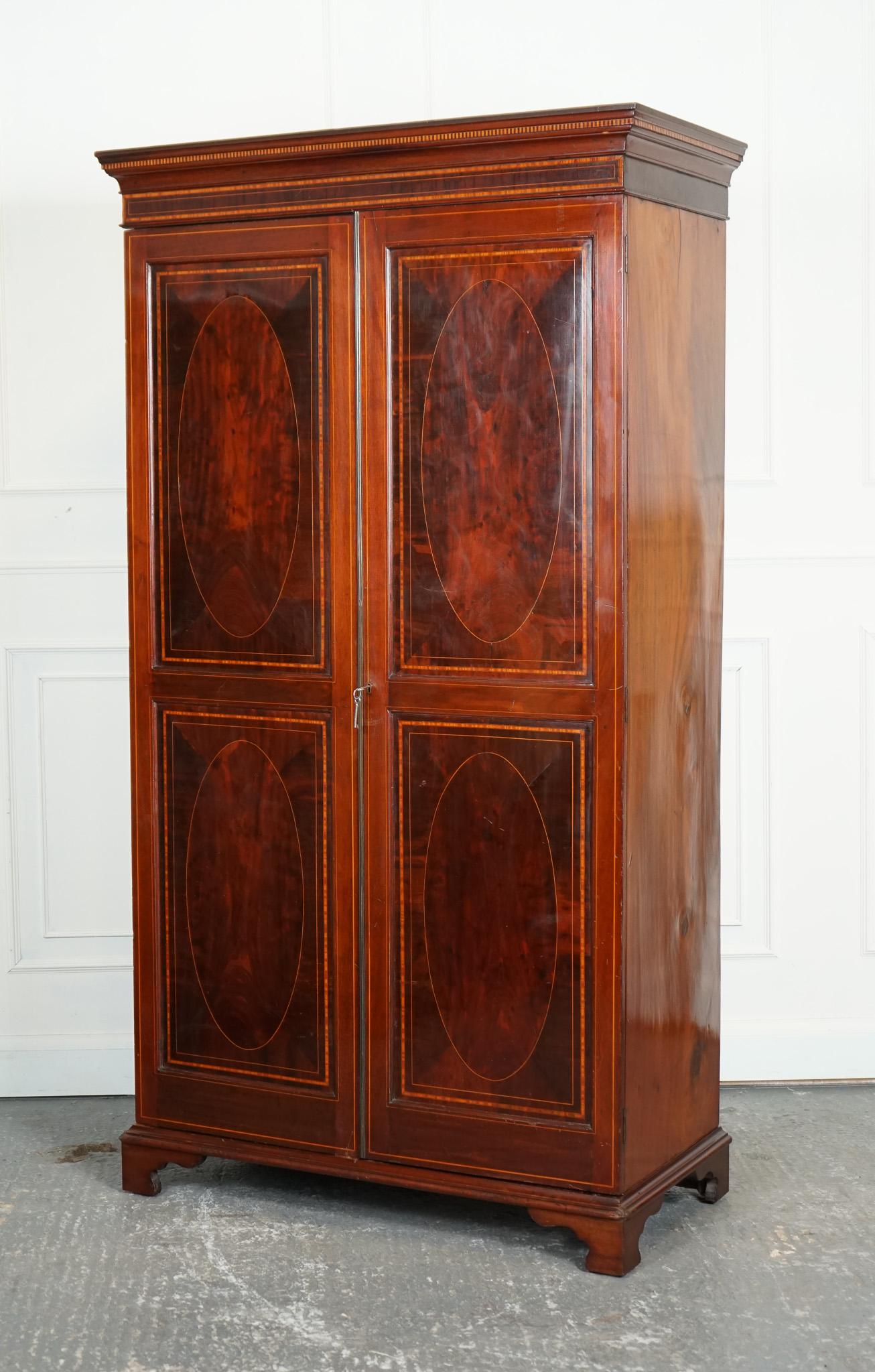 
We are delighted to offer for sale this Edwardian Flamed Hardwood Sheraton Revival Double Wardrobe.

An Edwardian flamed hardwood Sheraton Revival double wardrobe is a luxurious and elegant furniture of the Edwardian era. The use of flamed hardwood