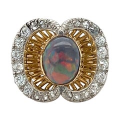 Anello francese edoardiano con opale nero e diamanti in oro giallo 18 carati e platino