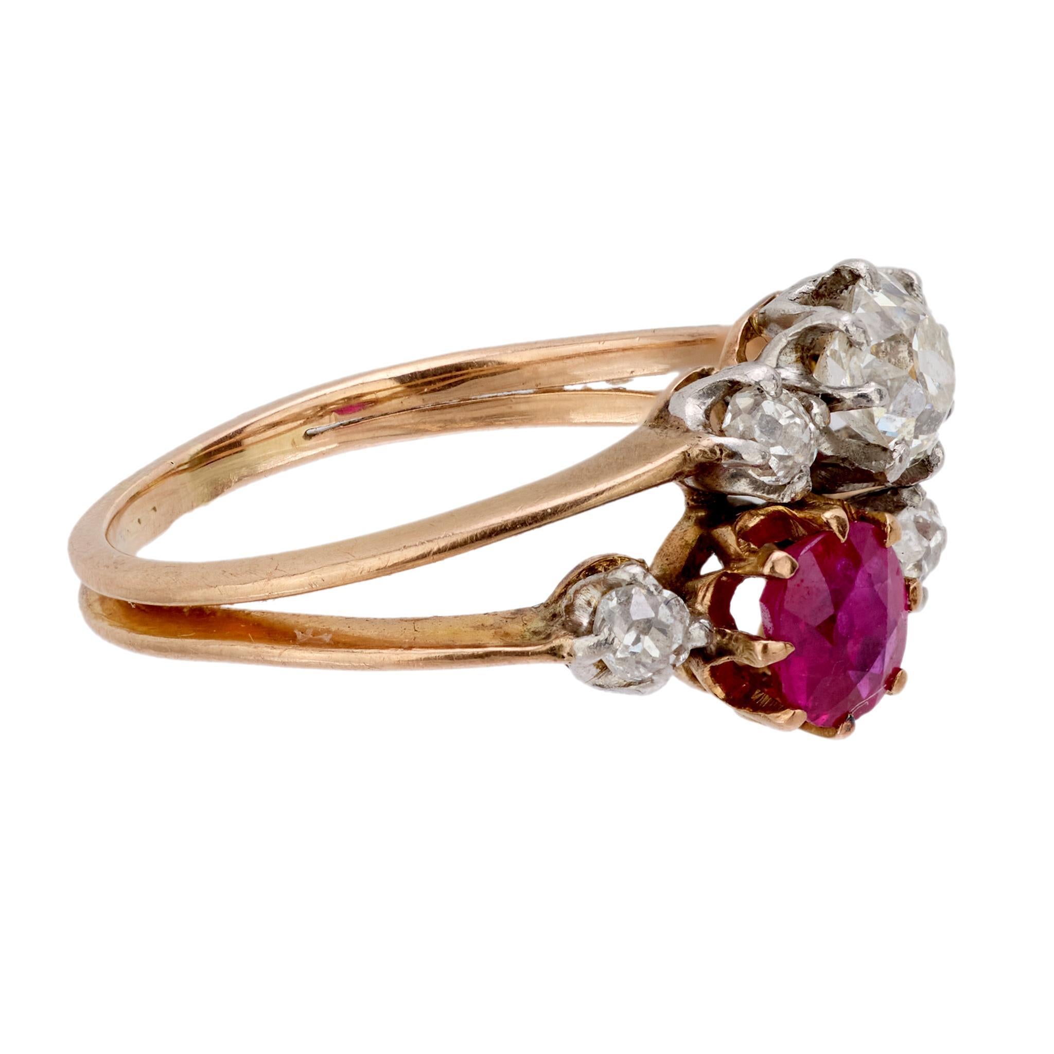Crafted in the 1910s, this Edwardian ring pairs a richly hued round cut ruby of approximately .40 carats with 5 old European cut diamonds totaling .60 carats, graded H-I color and VS clarity. The diamonds offer a delicate brilliance that enhances