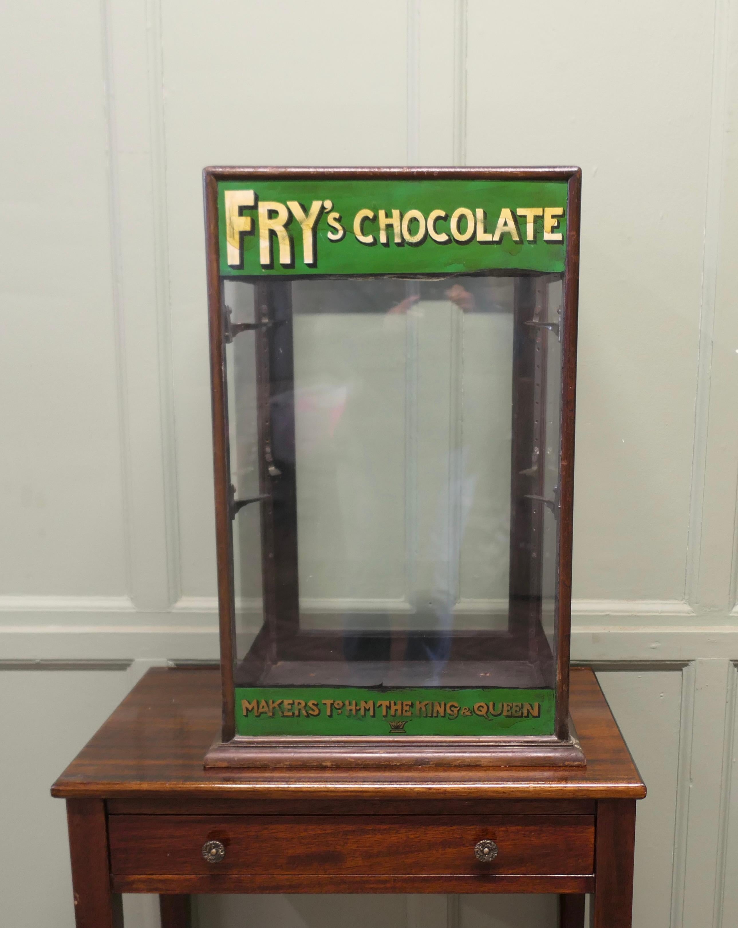 Edwardian Fry’s Counter Top Shop Display Cabinet 
This Sweet Shop Cabinet has advertising banners for Fry’s painted across the top and bottom at the front, this is in the original Green and Gold colour used by Fry’s, the paint has been recently