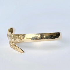 Edwardian Garnet and 9 Carat Gold Snake Bangle