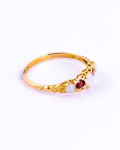 Edwardian Garnet and Opal 9 Carat Gold Five-Stone Ring