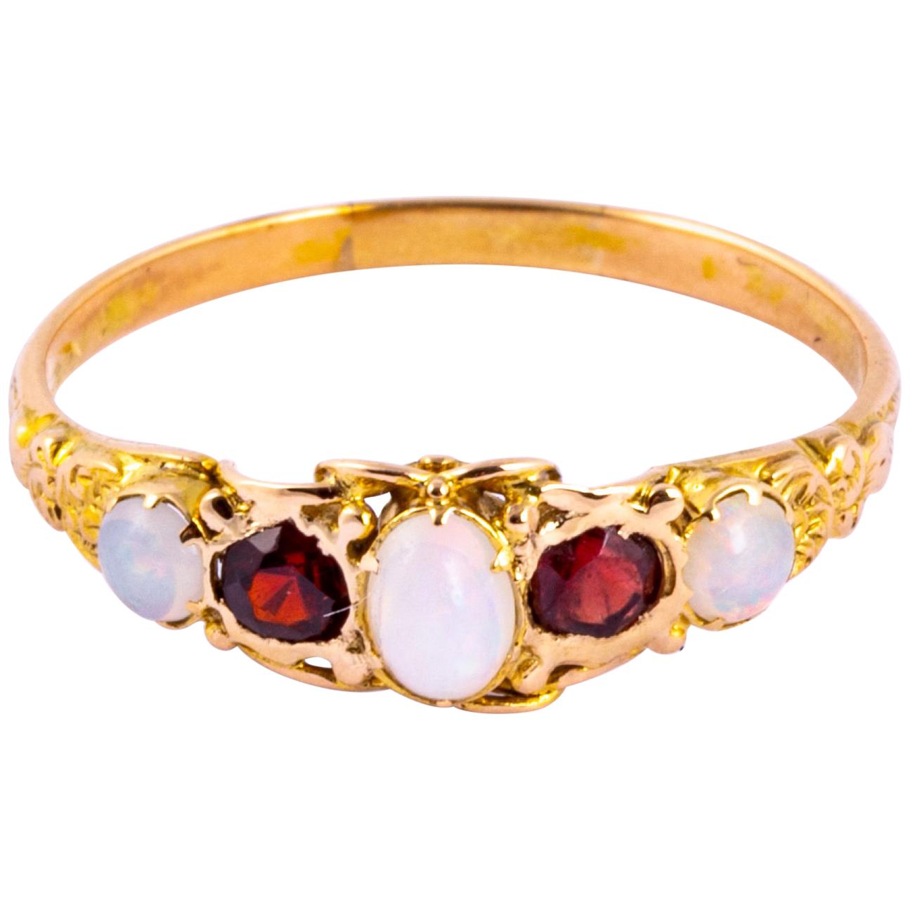 Edwardian Garnet and Opal 9 Carat Gold Five-Stone Ring For Sale