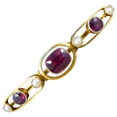 Edwardian Garnet and Pearl Panel Expandable Bracelet in 9 Carat Yellow Gold