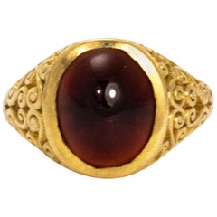 Edwardian Garnet Cab and 9 Carat Gold Ring