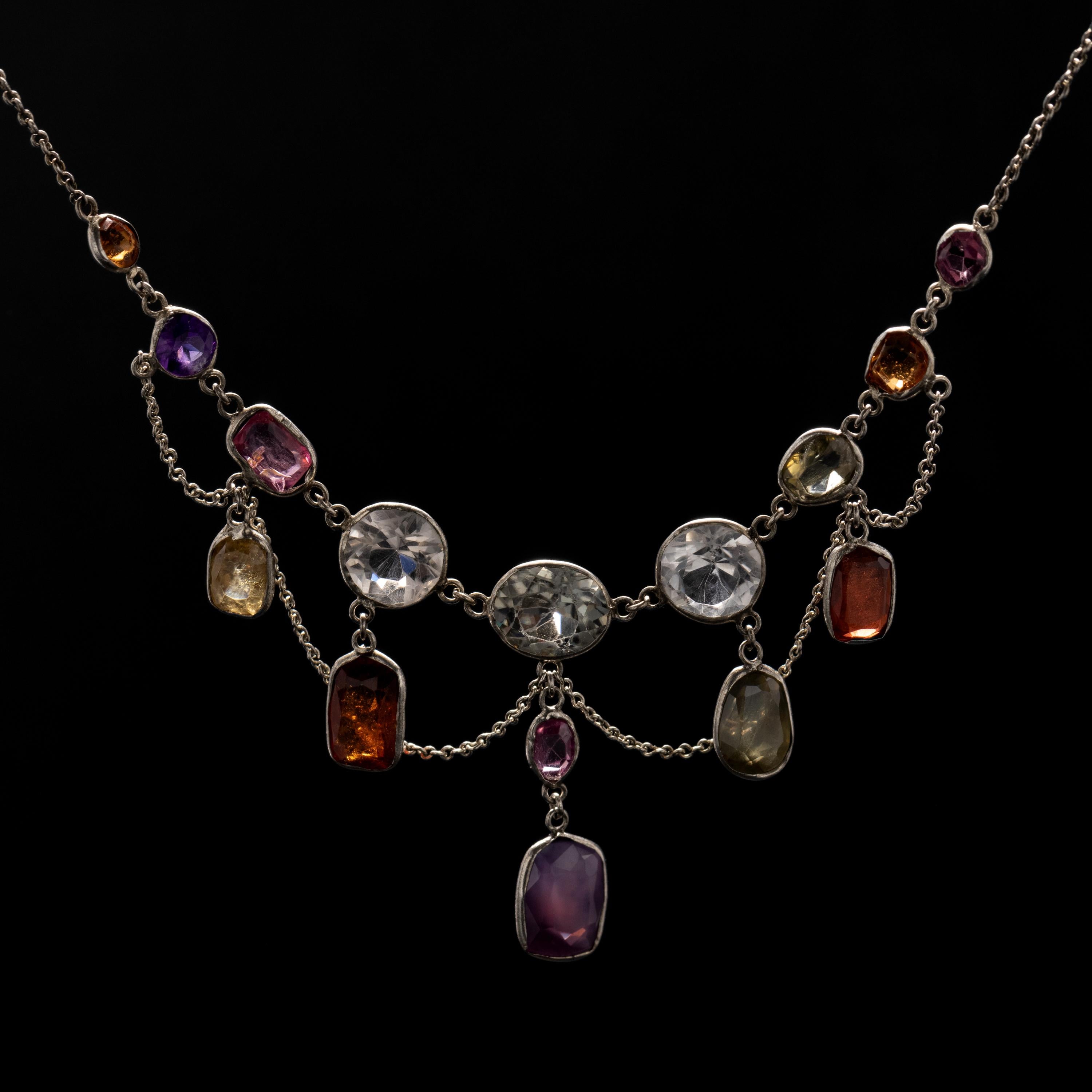 Delicate though powerful: that's how I would describe this rare and exceptionally beautiful Edwardian-era festoon necklace. Crafted entirely by hand just after the turn of the previous century (circa 1901), this 15