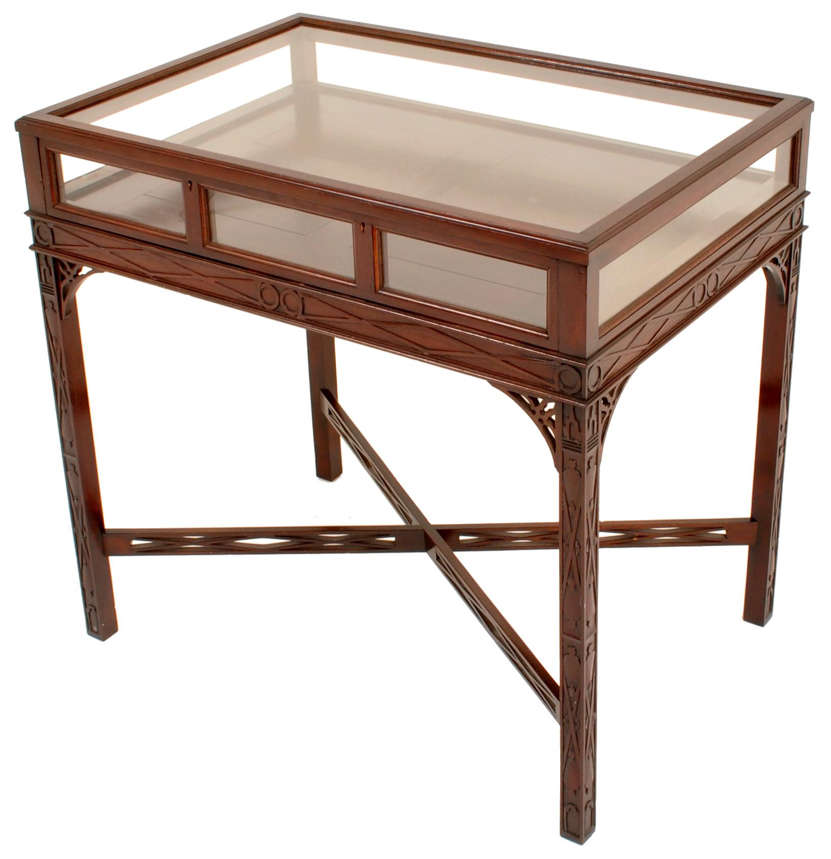 Antique Edwardian George III Chinese Chippendale style Bijouterie table / vitrine/ display case, circa 1900. A rectangular, shallow, display case table on four square legs with crossed stretchers, having 'blind fretwork' to the skirt and the legs