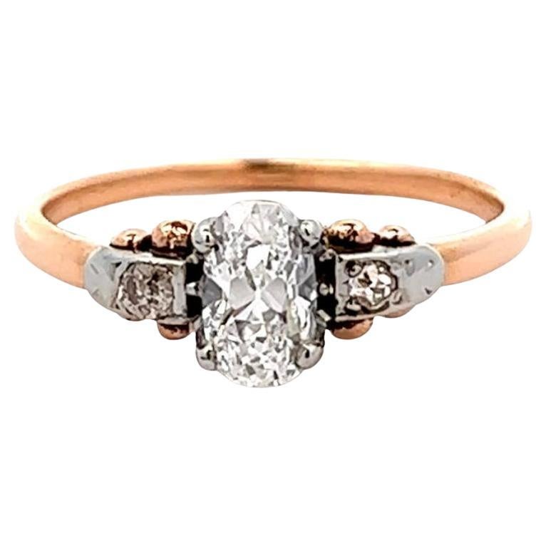 Edwardian GIA 0.62 Carats Cushion Cut Diamond 14 Karat Rose Gold Platinum Ring