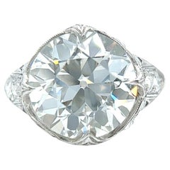Edwardian GIA 7.01 Carats Old European Cut Diamond Platinum Filigree Ring