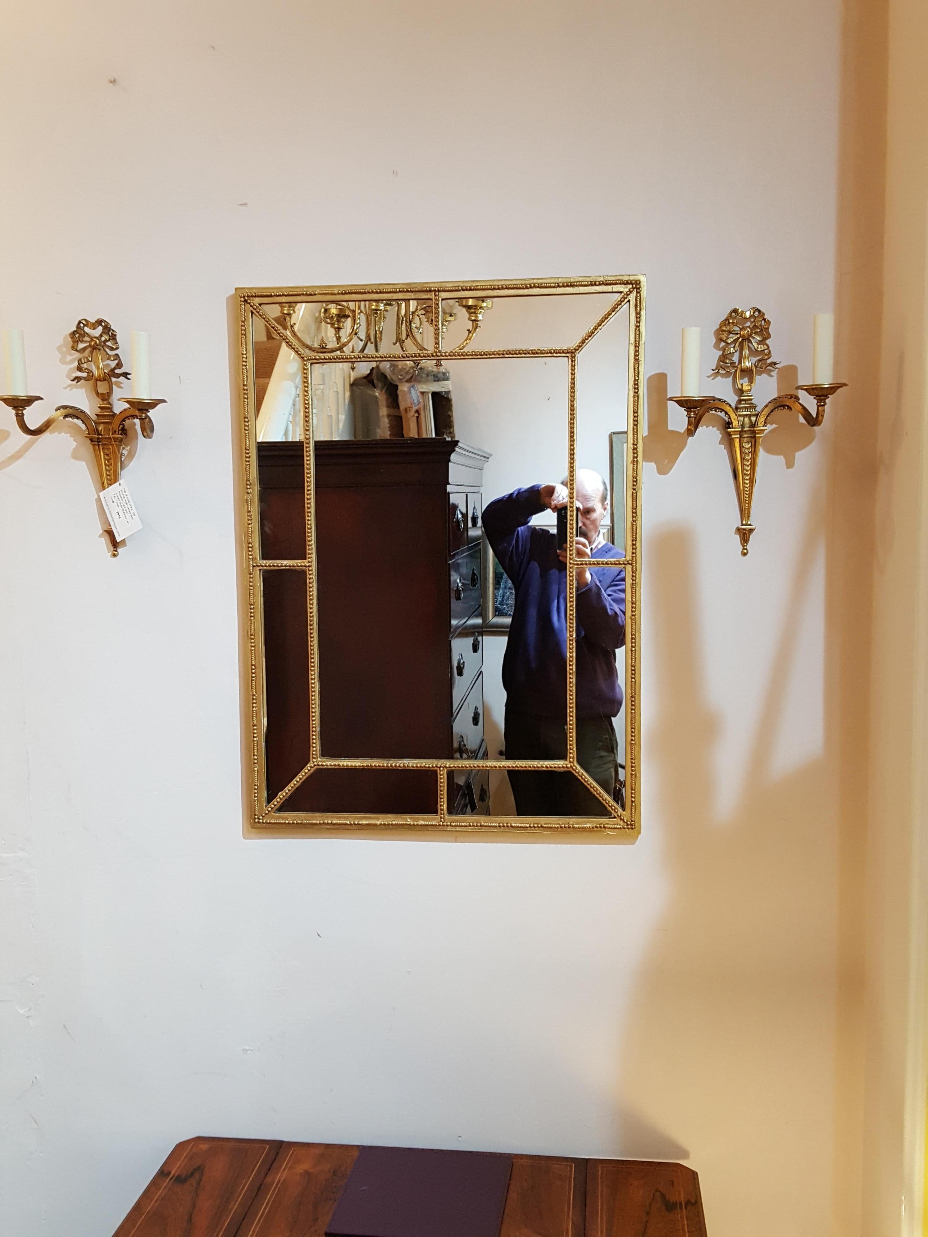Edwardian gilt framed mirror with egg and dart applications
Measures: 25