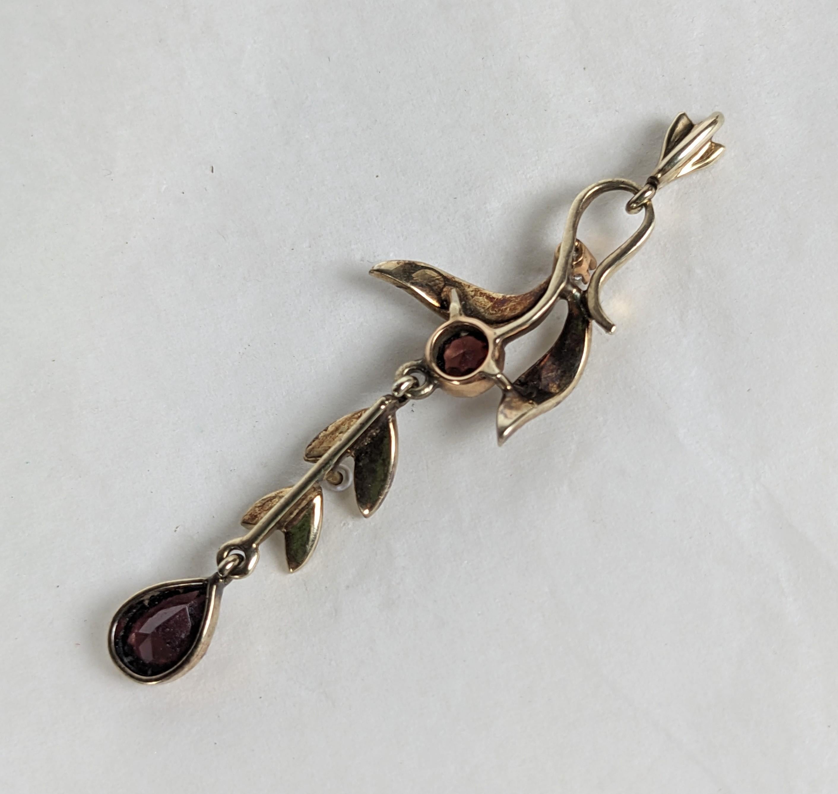 Edwardian Gold Diamond and Garnet Vine Pendant In Excellent Condition For Sale In New York, NY