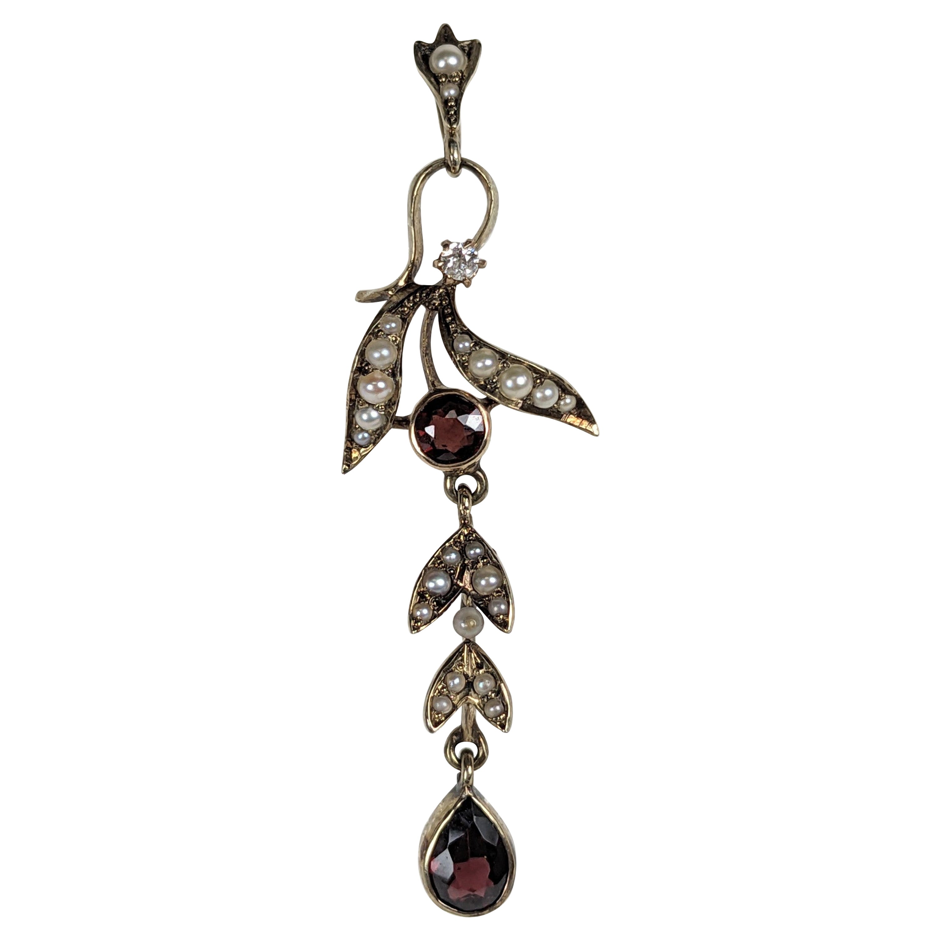 Edwardian Gold Diamond and Garnet Vine Pendant For Sale