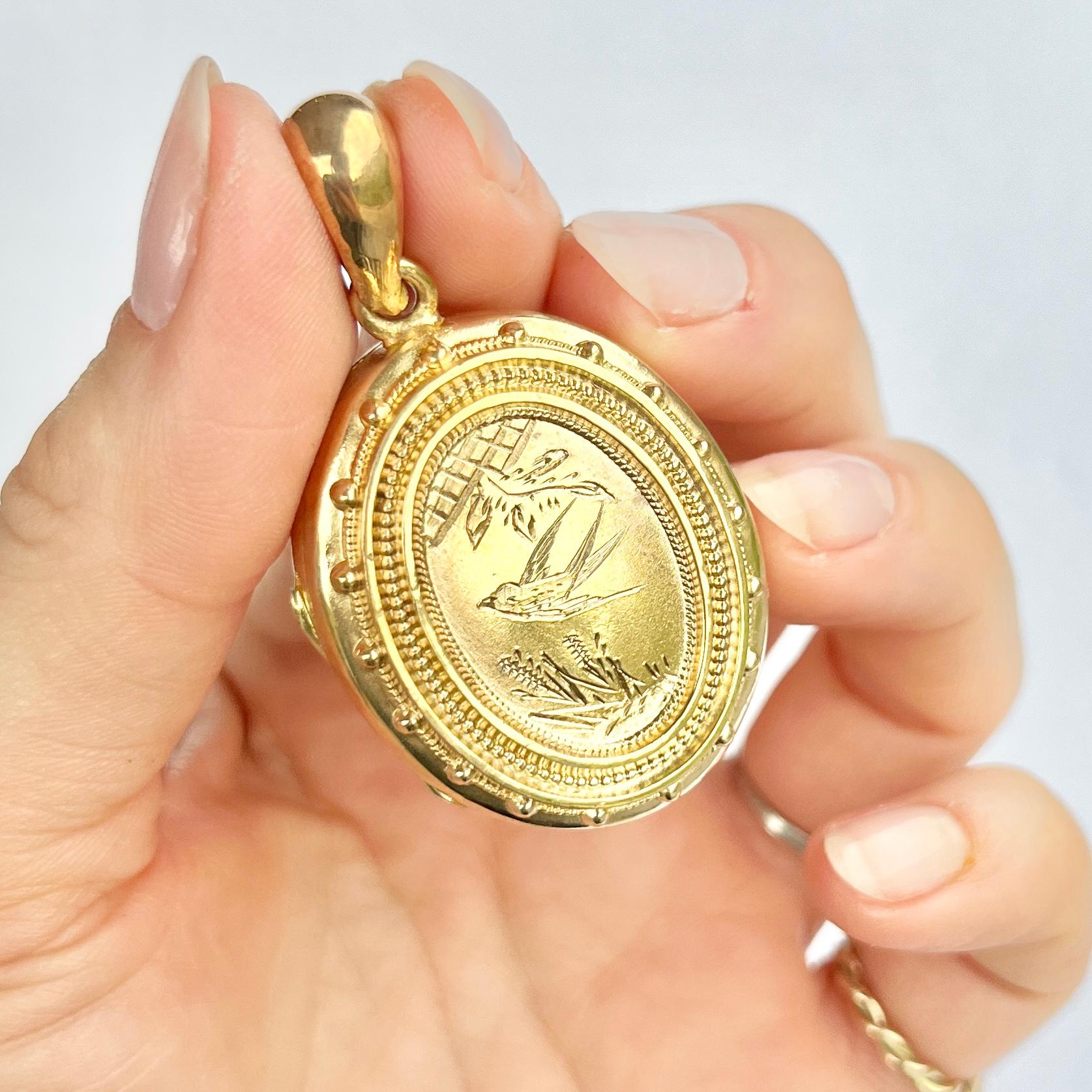 This locket is gold gilt and has beautiful detail on it. The inside of the locket still has the original panes of glass. 

Locket Dimensions 36x28mm

Weight: 17g