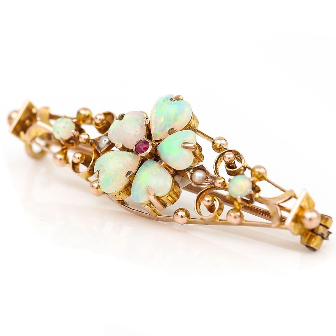 Heart Cut Edwardian Gold Heart Shaped Opal, Ruby and Pearl Bar Brooch Circa 1905 For Sale