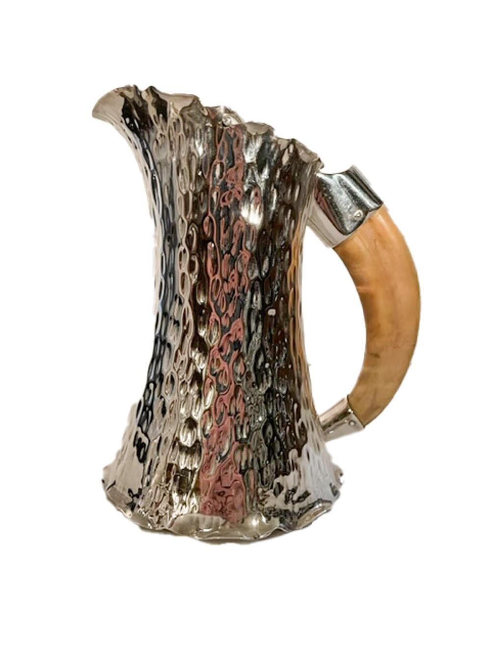 Edwardian silver plate pitcher in the form of a tree trunk and hammered to resemble the tree's bark with a boar tusk handle and pivoting lid. Marked H&H for Hukin and Heath.