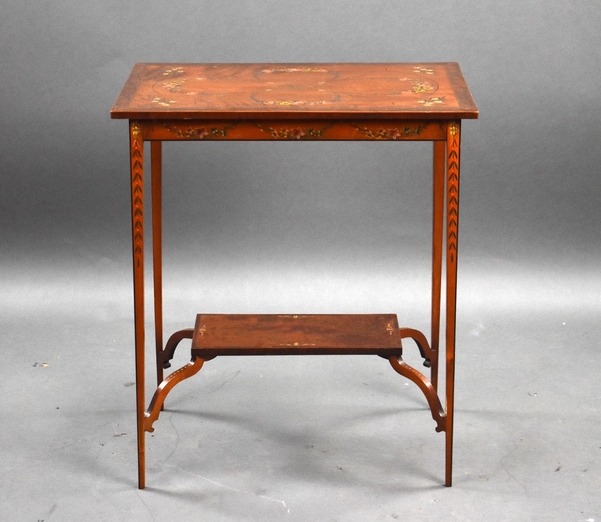 For sale is a good quality Edwardian hand painted satinwood occasional table, raised on tapered legs united by a stretcher, the table remains in very good condition for its age.

Width: 59cm Depth: 39cm Height: 67cm