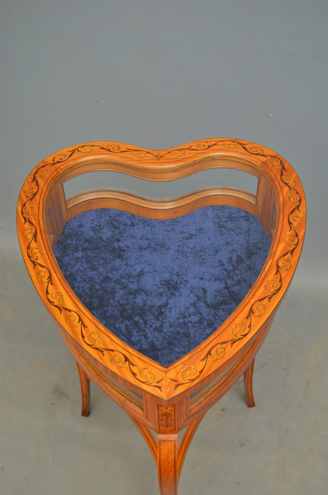 heart shaped curio table