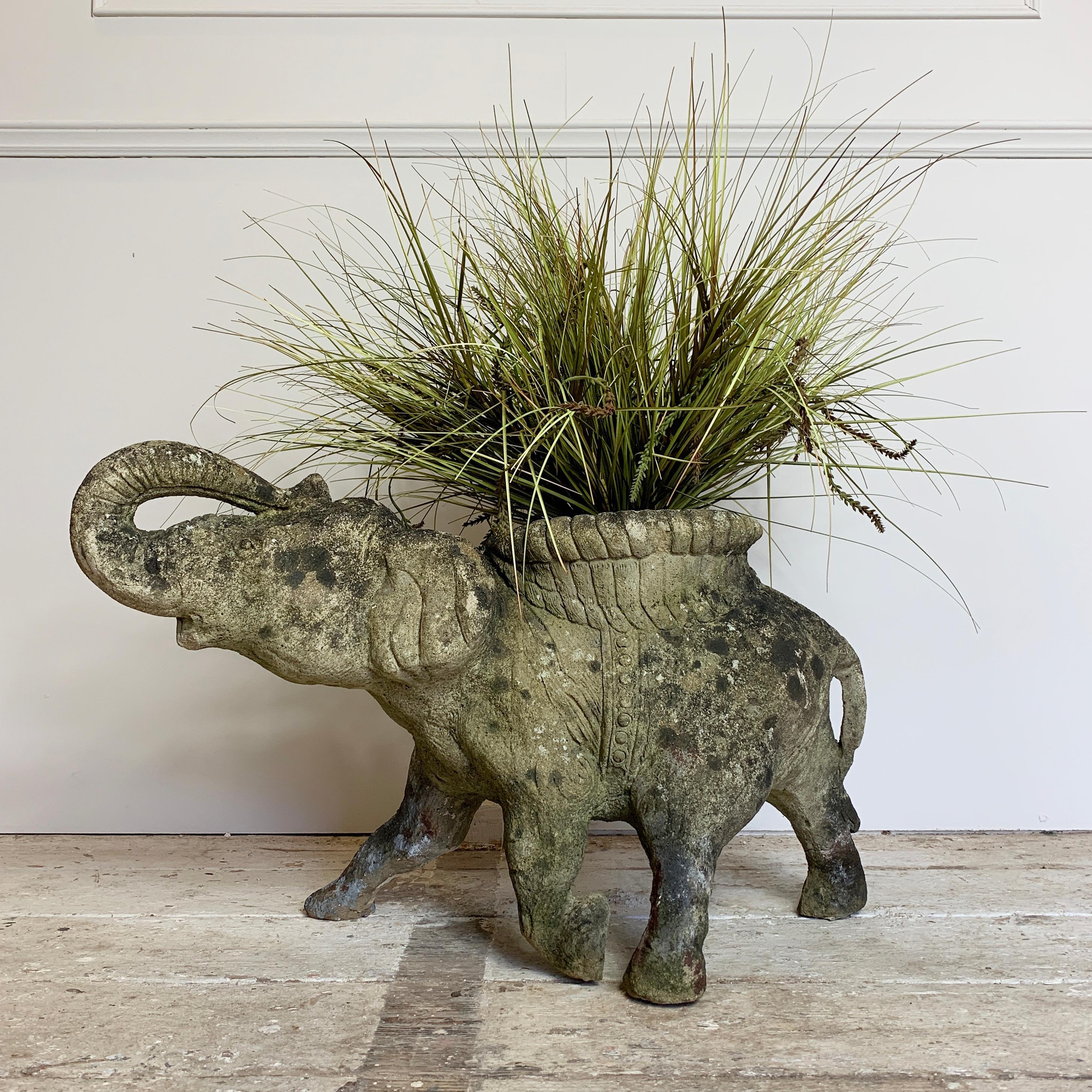 Late Victorian/ early Edwardian Indian stone elephant planter. English. Very early 20th century. Fabulous elephant with 'Howdah' seat design for a planter. Very detailed patterns to the body, facial features and skin. The elephant stands on 4 legs,