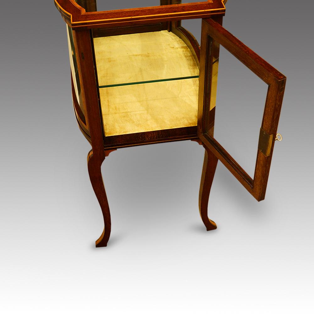 Edwardian inlaid curio display cabinet
This Edwardian inlaid curio display cabinet was made circa 1900.
A cabinet of this type was used to display precious items that had been purchased by the owners of their travels on a Grand Tour. On these