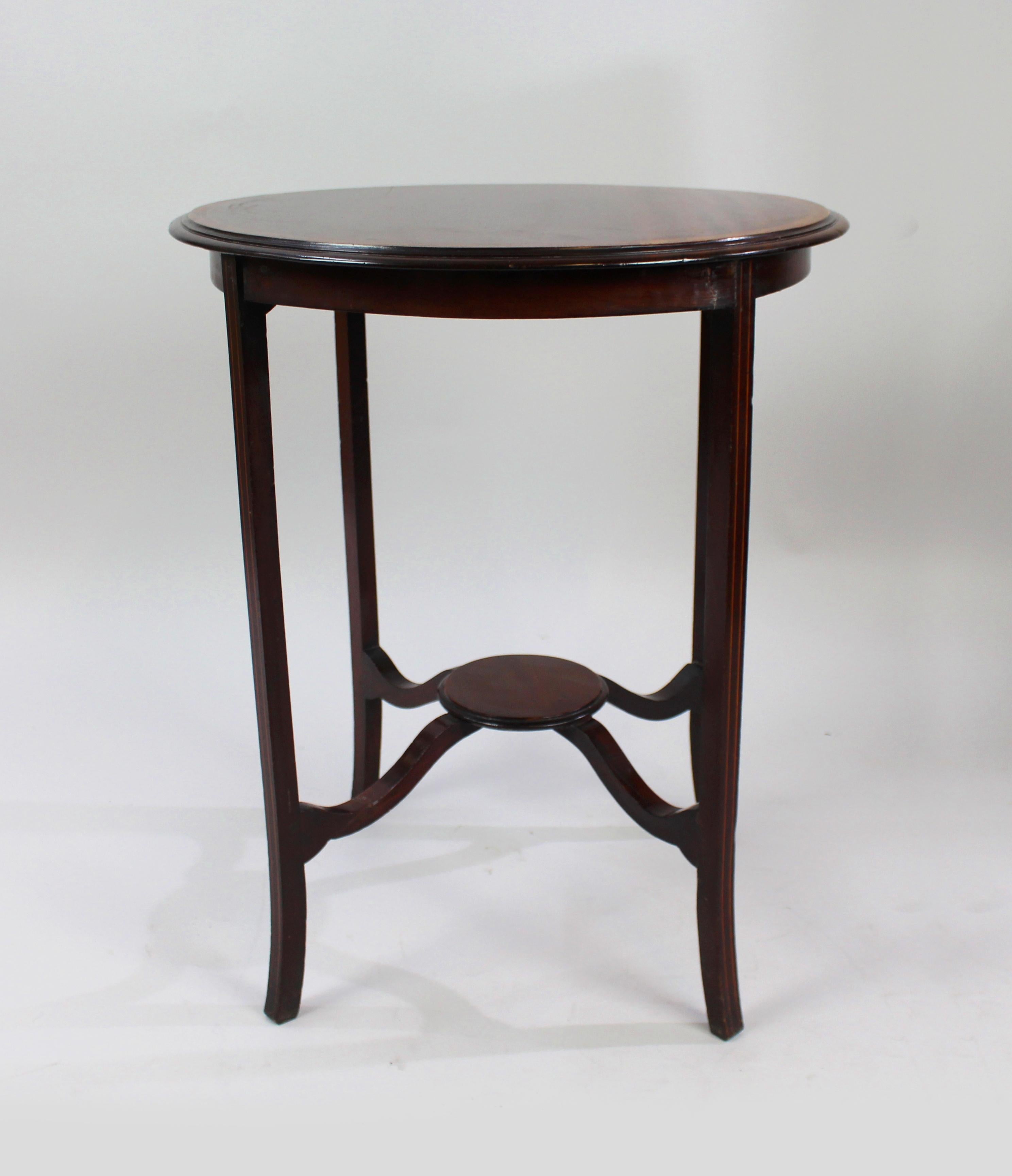 
Period	
Edwardian

Wood	
Mahogany, satinwood & ebony inlay

Condition	
Good condition. A few old repairs to legs, sound structure. A few marks to finish commensurate with age
 

 

English lamp table c.1900

Mahogany top with satinwood & ebony