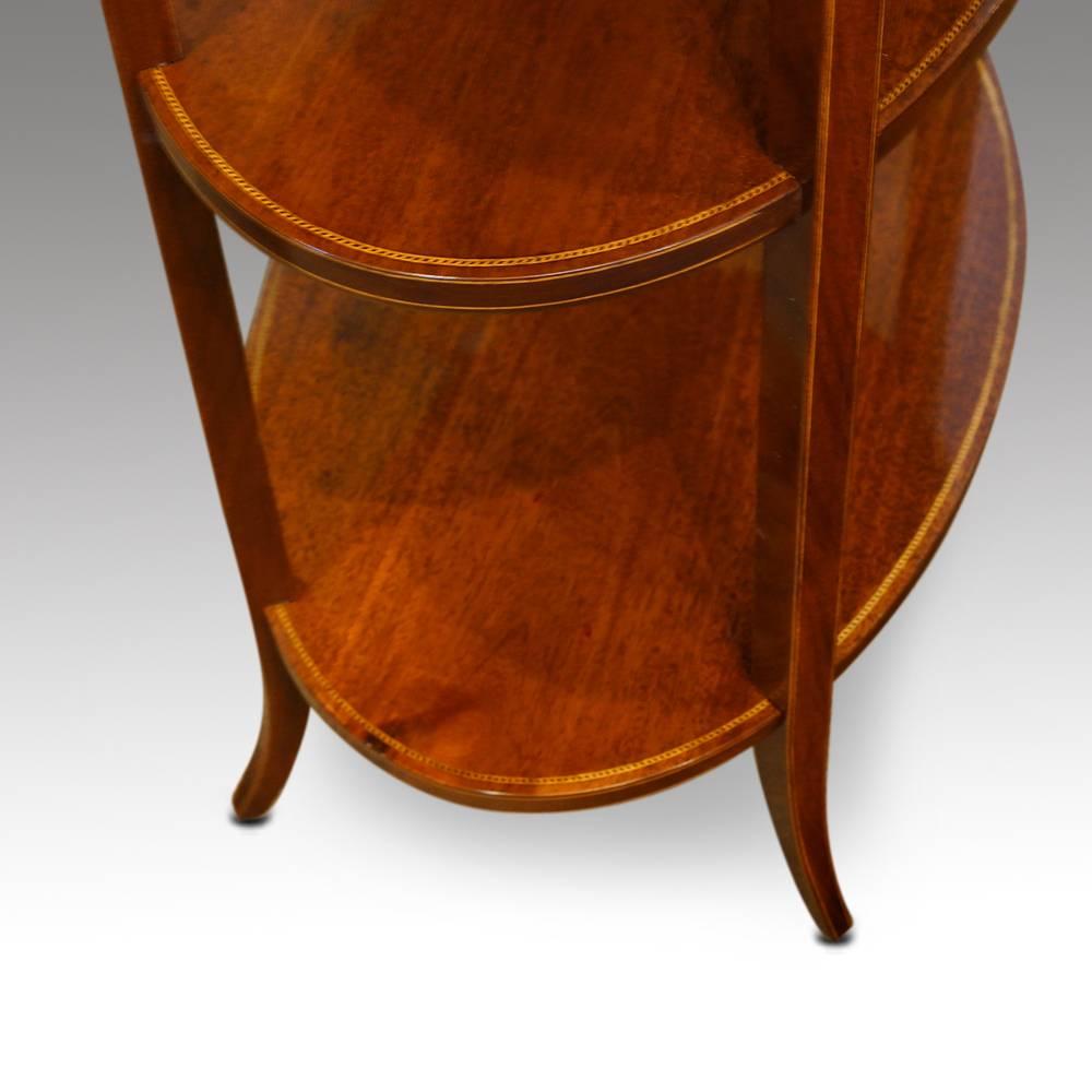 Edwardian inlaid mahogany oval tray table
This Edwardian inlaid mahogany oval tray table was made circa 1910.
The Edwardian era was undoubtedly the age of elegance, and this table has the charm and class from that period.
The three-tier table is