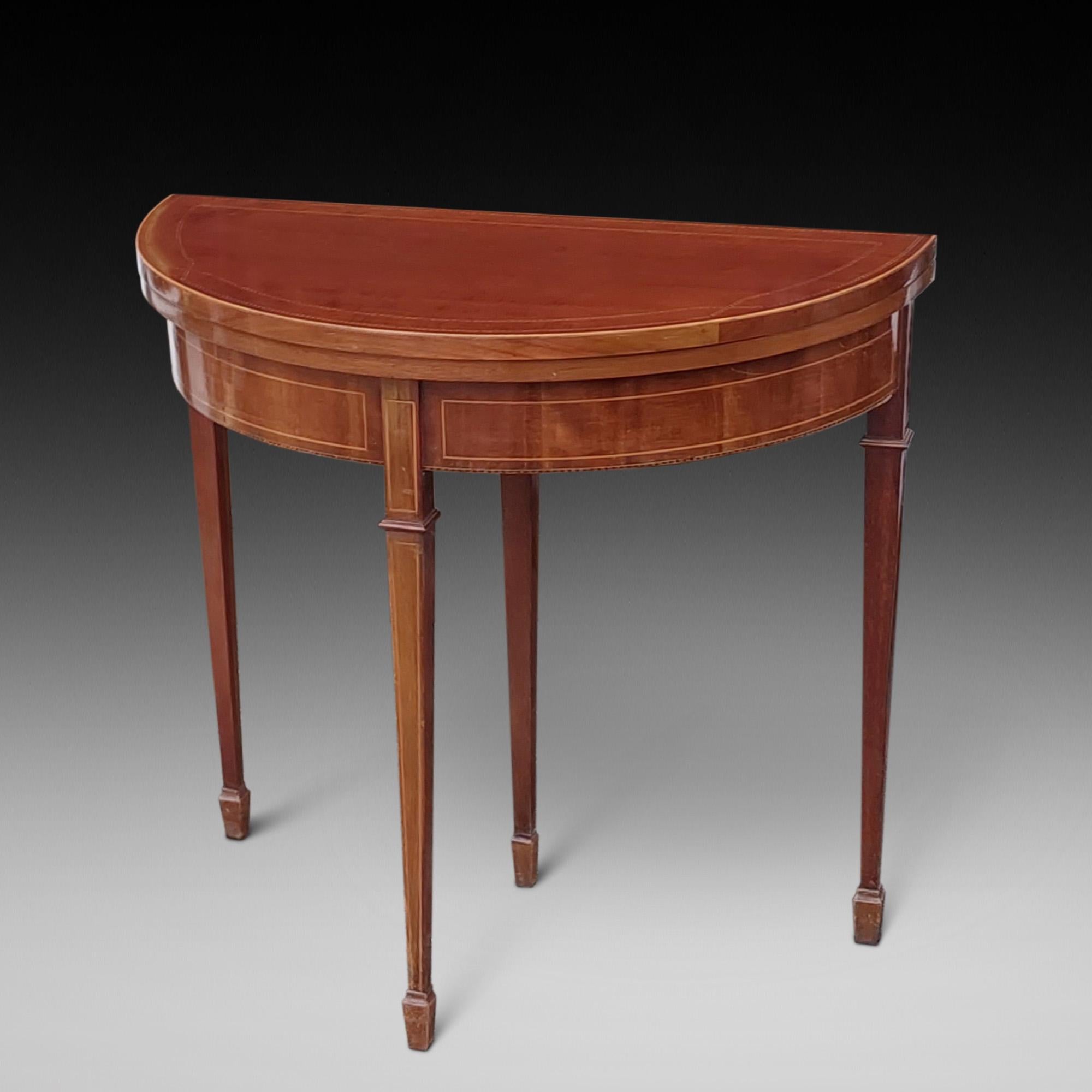 Edwardian inlaid mahogany turnover top card table, with recessed frieze and raised on tapered legs of square section terminating in spade feet - 30