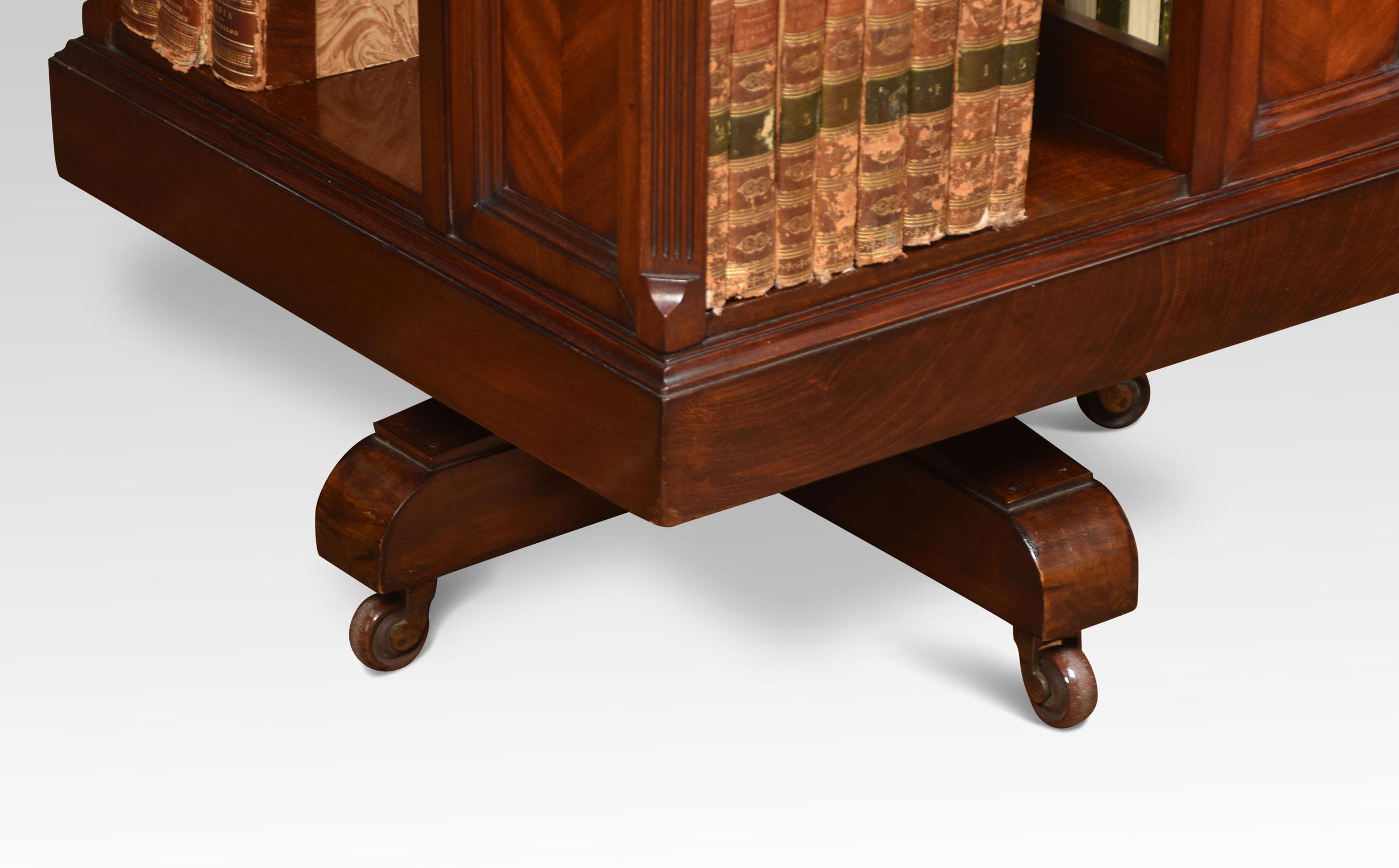 Edwardian inlaid revolving bookcase, the flame mahogany top with banded edge. Above an arrangement of shelves. Supported on flame mahogany inlaid panels, all raised up on cruciform base with original brass castors.
Dimensions
Height 34.5