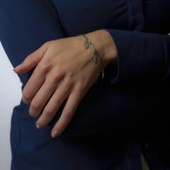 Edwardian inspired 3.30 carat diamond platinum charm bracelet