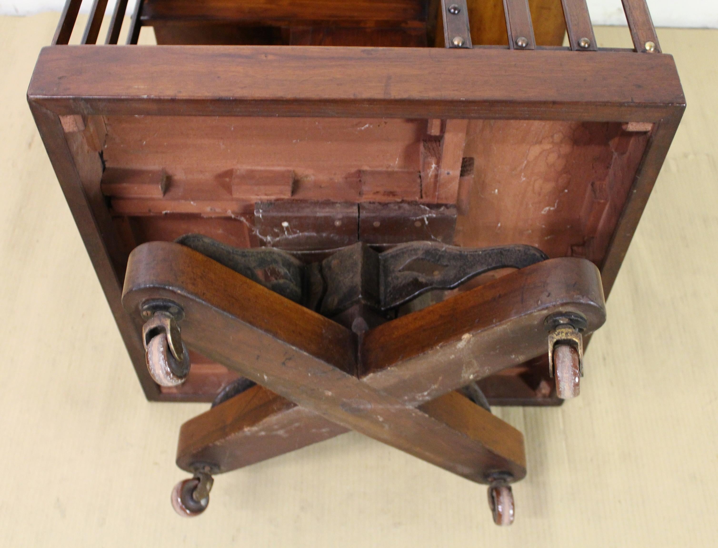 A good quality late Victorian/Edwardian period revolving bookcase with an iron base. Probably by Maple and Co (although not marked) and very well constructed in straight grain walnut timber. With generous storage capacity for your books and freely