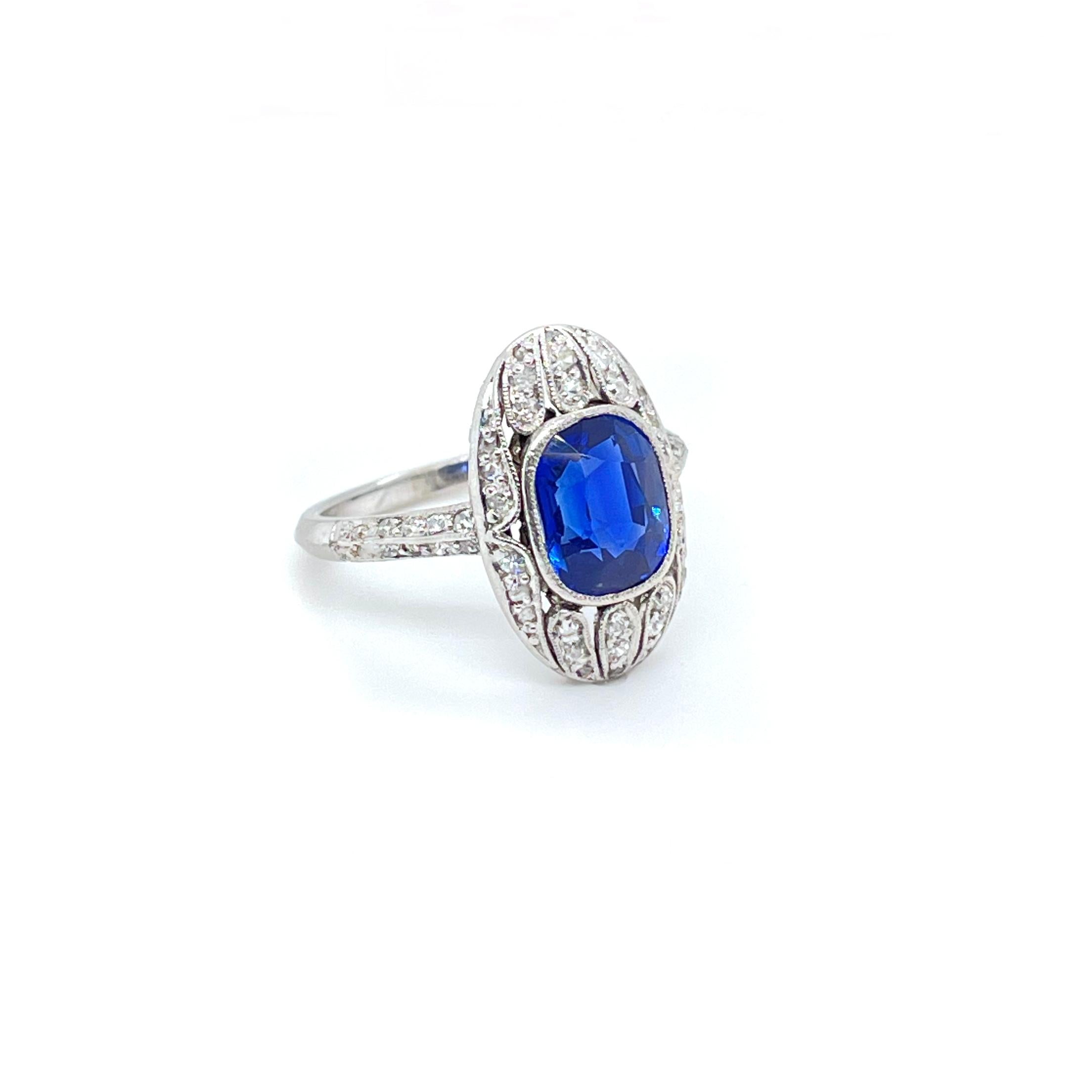 Edwardian Kashmir Sapphire and Diamond Ring, ca. 1910s

A very complete Kashmir sapphire and diamond ring from the 1910s. The central Kashmir sapphire weighs 2.56 carats (certified SSEF) and is of a beautiful intense velvety blue colour with a very