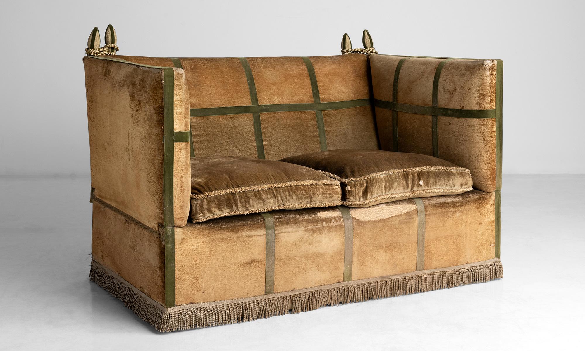 Edwardian Knole sofa.

England circa 1910.

In original velvet upholstery, with adjustable sides for reclining.

Measures: 61”L x 39.25” D x 42.5” H x 19”seat.